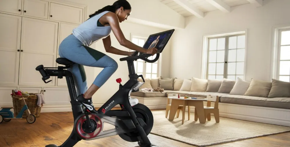 Peloton se alía con Spotify para incorporar contenidos fitness a nivel global